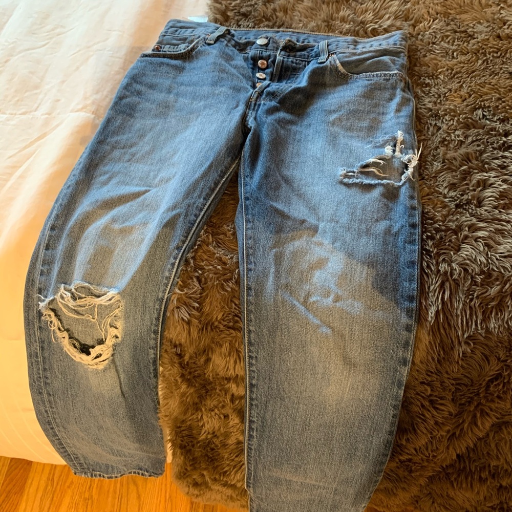 Levi 501 ripped tapered jeans